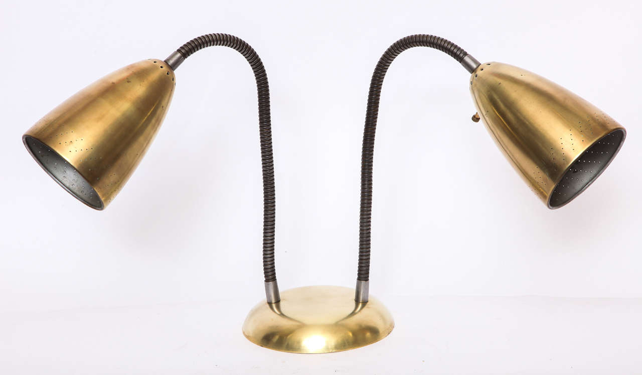 A 1940s American modernist articulated table lamp by Kurt Versen.