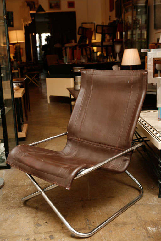 This is a very  comfortable leather chair designed by Uchida.