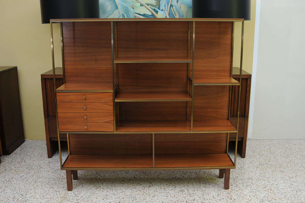 SOLD FEB 2013 Wonderful walnut & brass etagere gallery of shelves and drawers by Furnette.  Designed by Mark J. Furst and Robert Fellner and produced by their Bronx located furniture company, Furnette.  Part of the Gallery Group, it is unmistakably