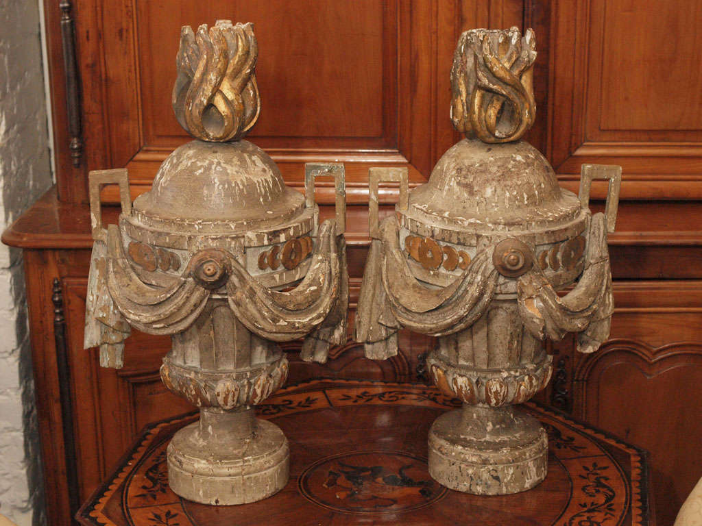 Pair of 18th c. Louis XVI painted and gilt draped Urns with flame finials