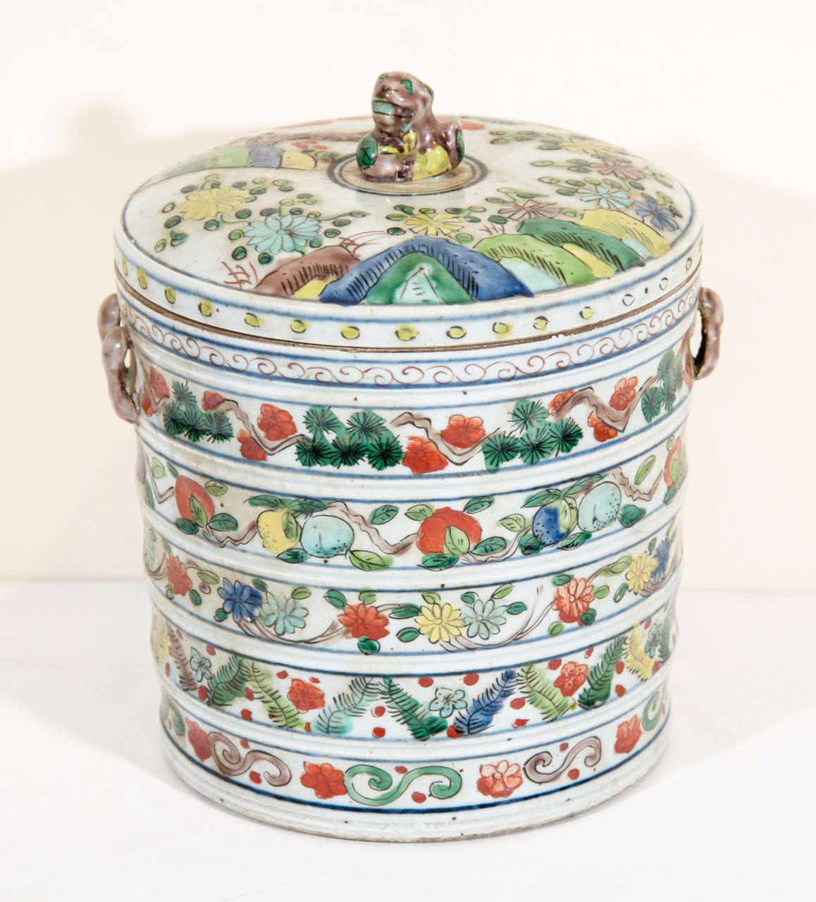 A whimsical, colorful antique Chinese porcelain food container.  From Shanxi Province, c. 1900.
CR530
