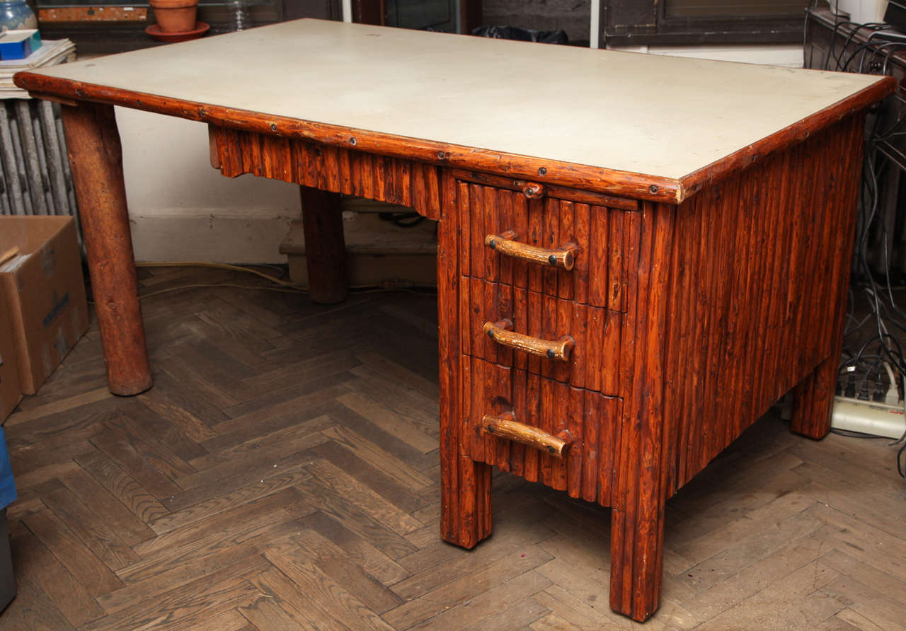 USA, circa 1930.

The provenance behind this desk allows us to believe this is an original piece made by Thomas Molesworth.

Handpicked by buyers at Ann-Morris, Inc.