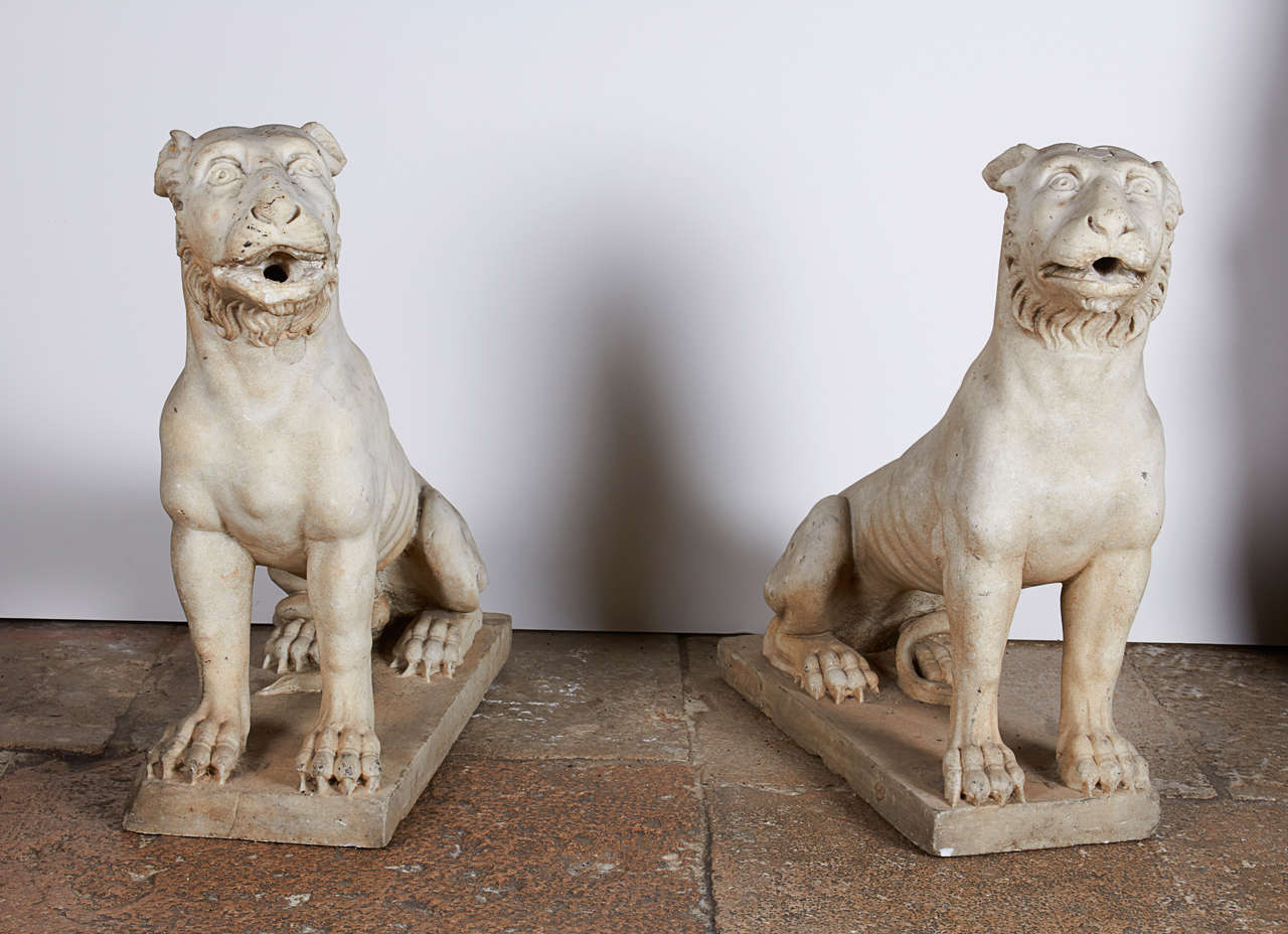 Pair of late 18th Century Italian marble Lions carved and stylized in a very unique form. Originally used as fountain figures.