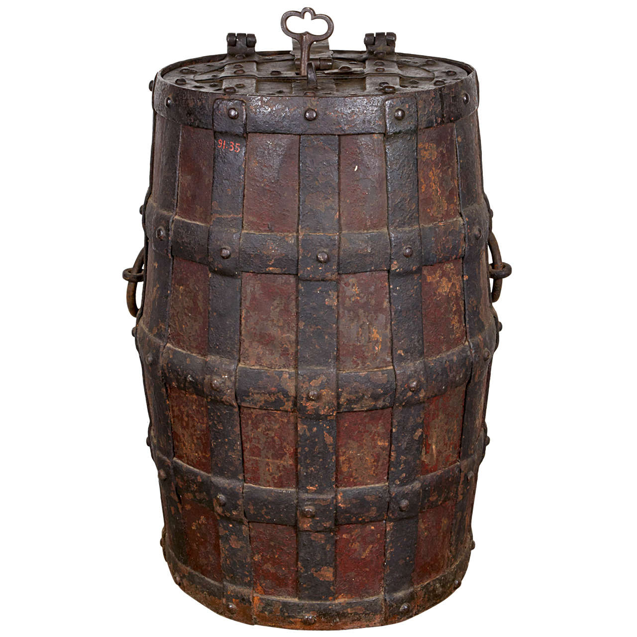 Mid 17th century Northern European Baroque iron safe in the form of a barrel, with the original key and bearing the monogram "GVS". Originally used for maritime travel to disguise valuable content.

20" diameter at widest