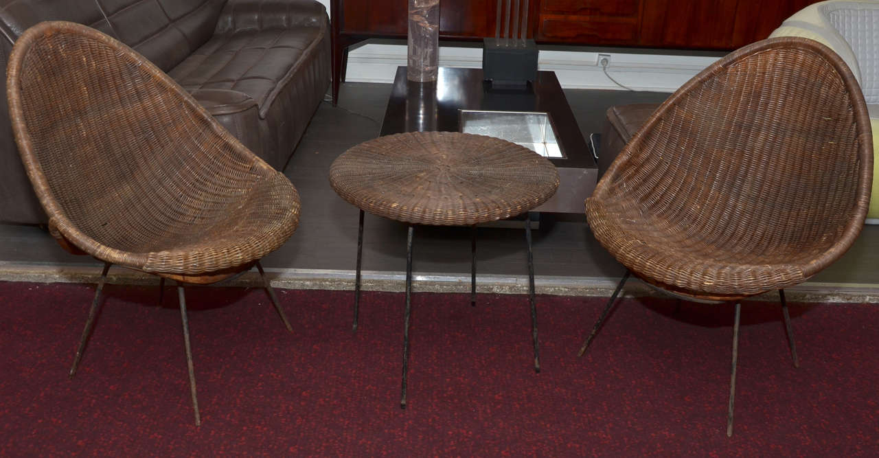 Rattan Living Room with two armchairs and one coffee table by Ico Parisi. Steel with black patina structure (used and rusted). Rattan with white patina (used). Normal wear consistent with age and use. Fading and rust on structure and rattan. Table