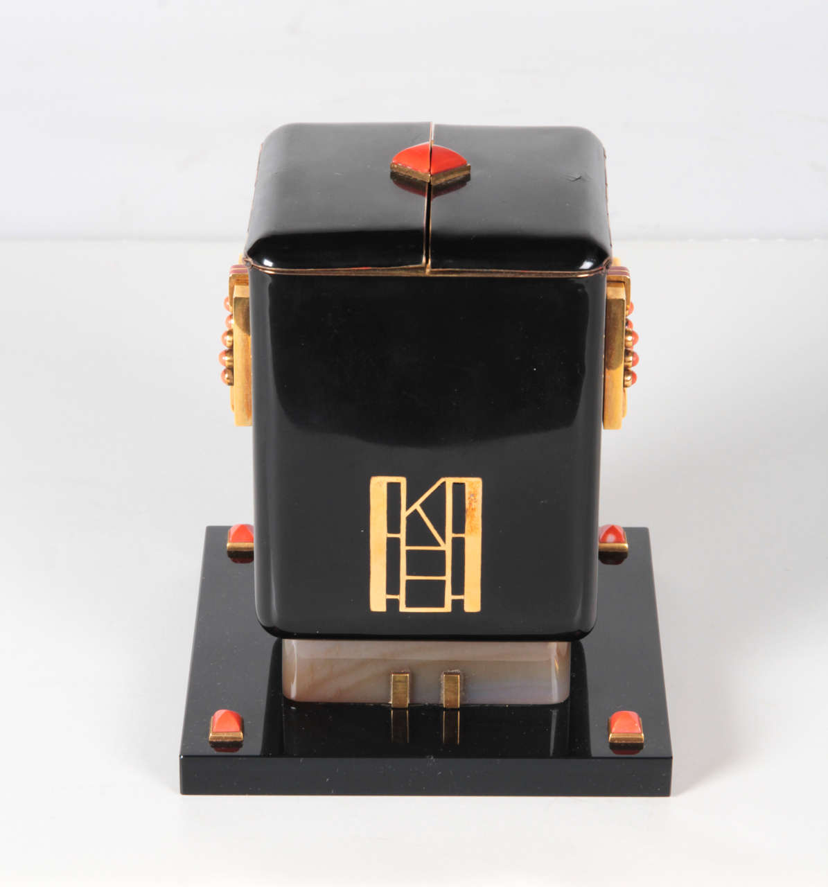 MAISON OSTERTAG (Place Vendome, Paris) 1920’s and 30’s
ARNOLD OSTERTAG (Jeweler / Designer)
VERGER FRERES (maker)

Art Deco jewel mounted mechanical covered box  c. 1925

Of rectangular stepped form, the black enamel box hinged and accented at