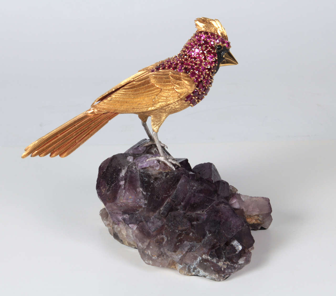 ASPREY & CO. LTD. (founded 1781) London, UK

Important Natural Ruby Gem Set 18K Gold Cardinal Bird Sculpture   1980 

Finely chased and chiseled 18K yellow and white gold realistically rendered sculpture of a Cardinal bird set with 
75+ carats