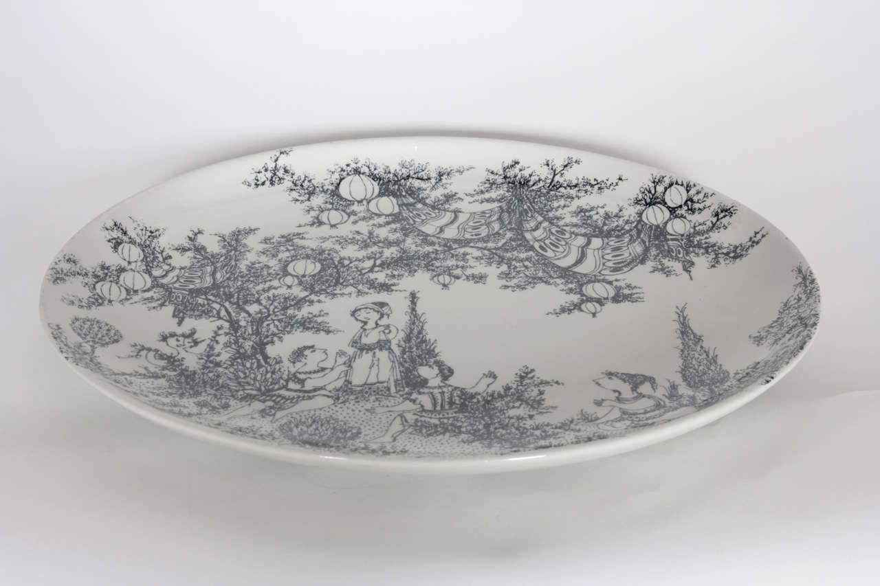 White ceramic platter with hand-painted scene from Shakespeare's play, A Mid-Summer Night's Dream." By Bjorn Wiinblad for Nymolle. Denmark circa 1960.

Inscribed on back with quote from a scene from the play and maker's marks.