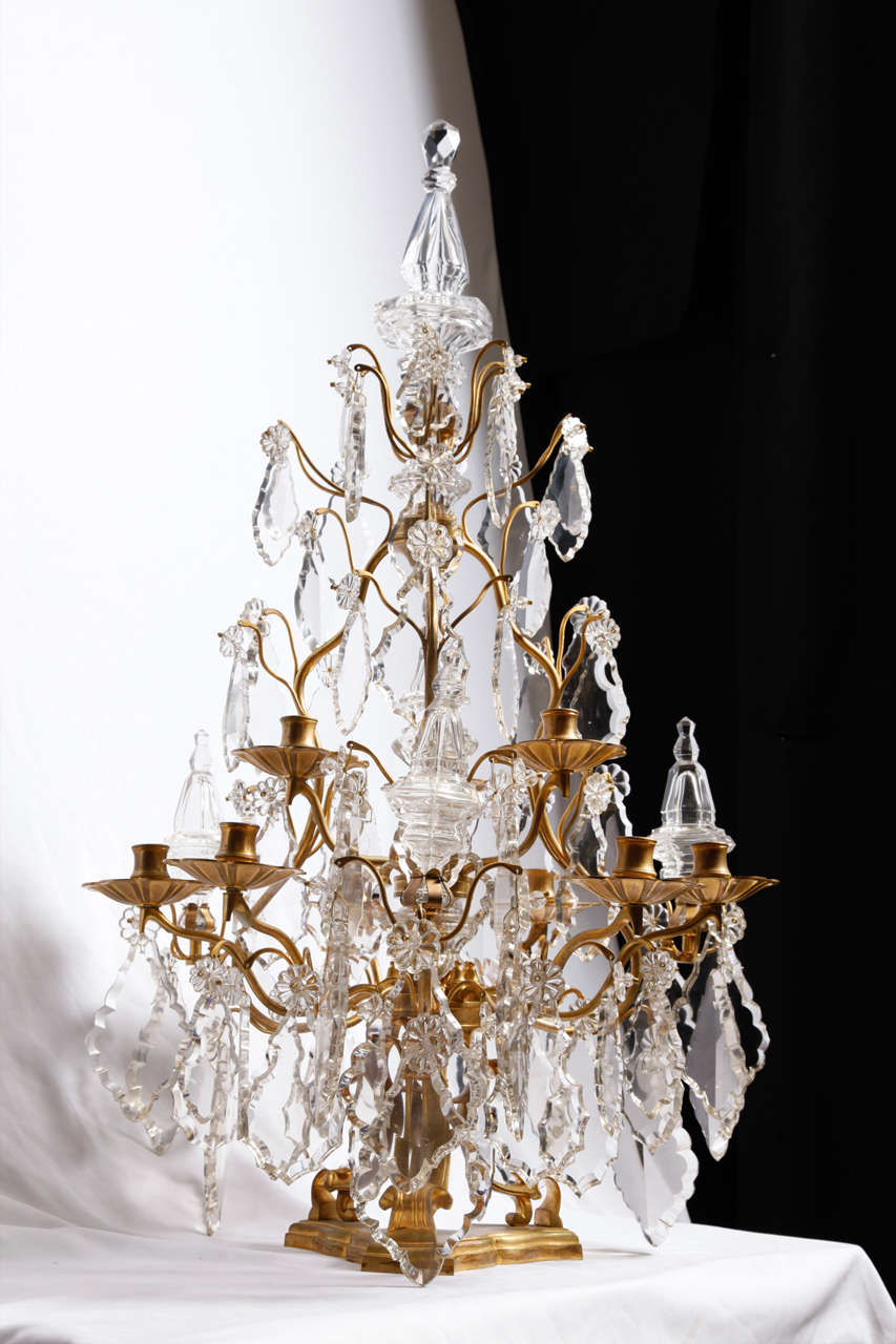 A Louis XV style Ormolu and Cut Crystal 9 Light Candelabra