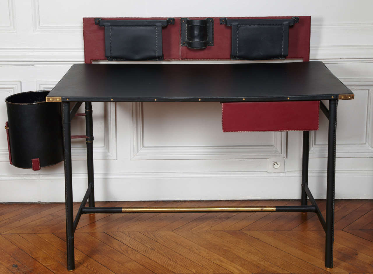 Rare Jacques Adnet stitched leather desk.