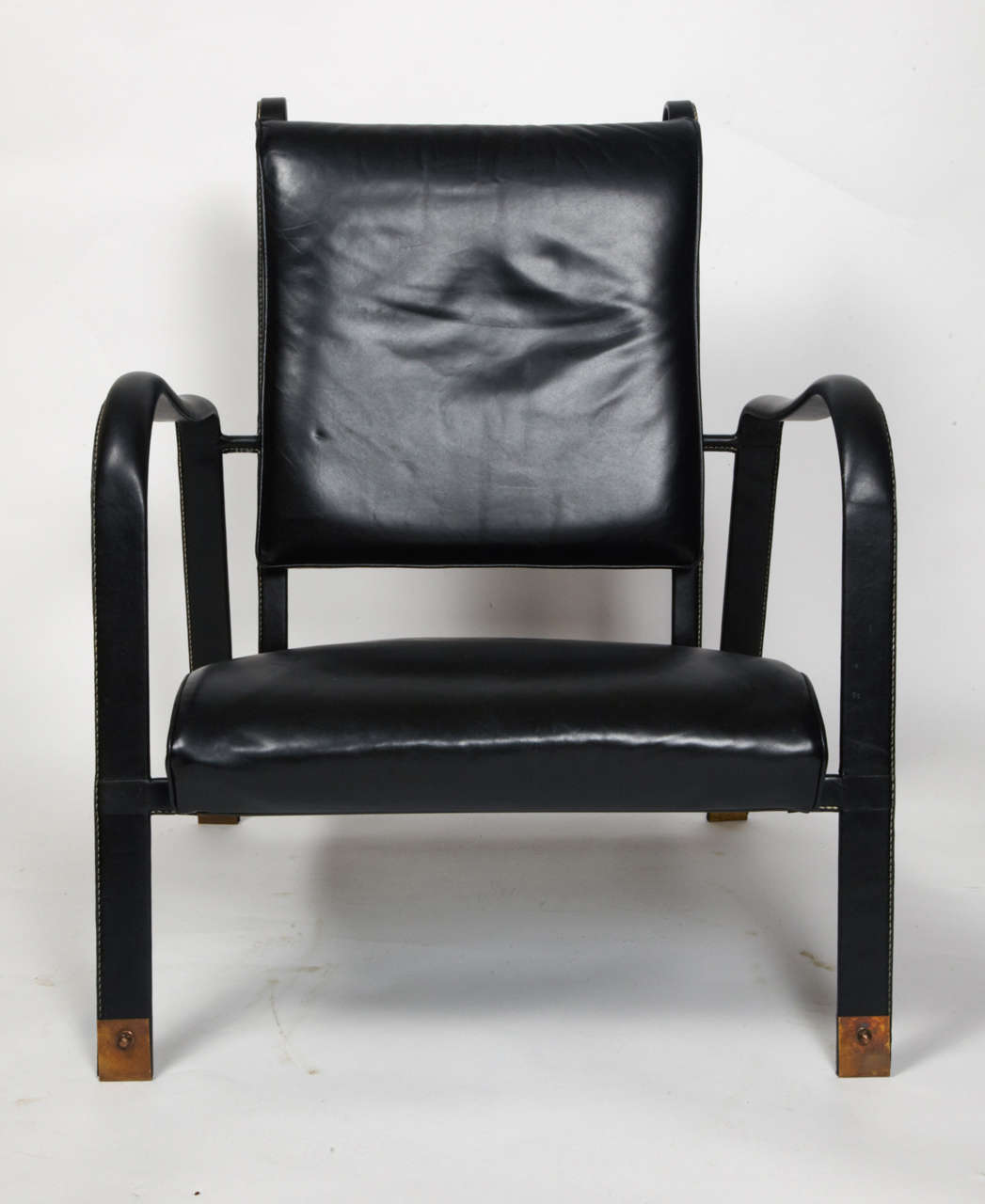 Stitched leather armchairs