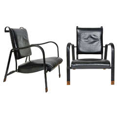Nice pair of armchairs by Jacques Adnet