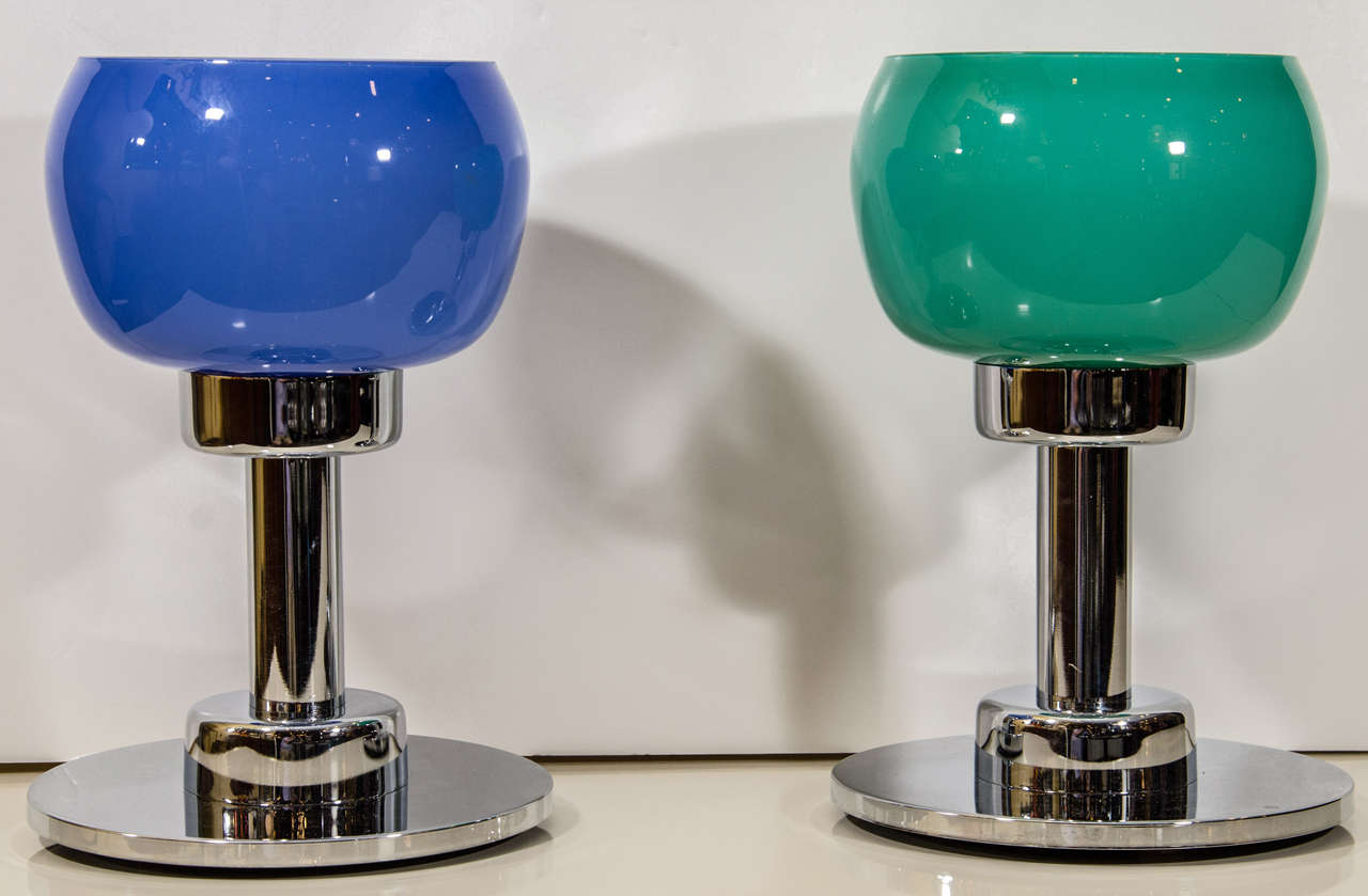 Beautiful pair of Italian accent lamps with art glass shades mounted on substantial, heavy chrome bases.