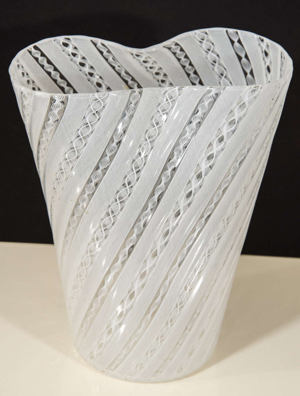 Very pretty and delicately detailed pinched latticino vase by Venini. White and clear art glass.