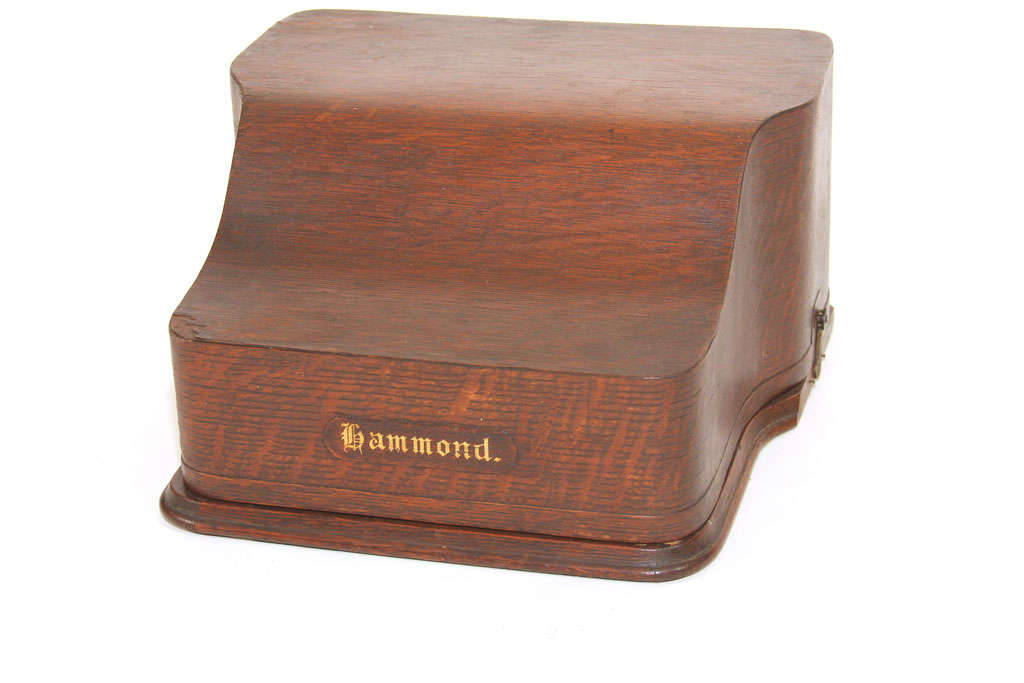 This very early Hammond Multiplex typewriter features a beautiful wood case. Fully functional with smooth gear operation.