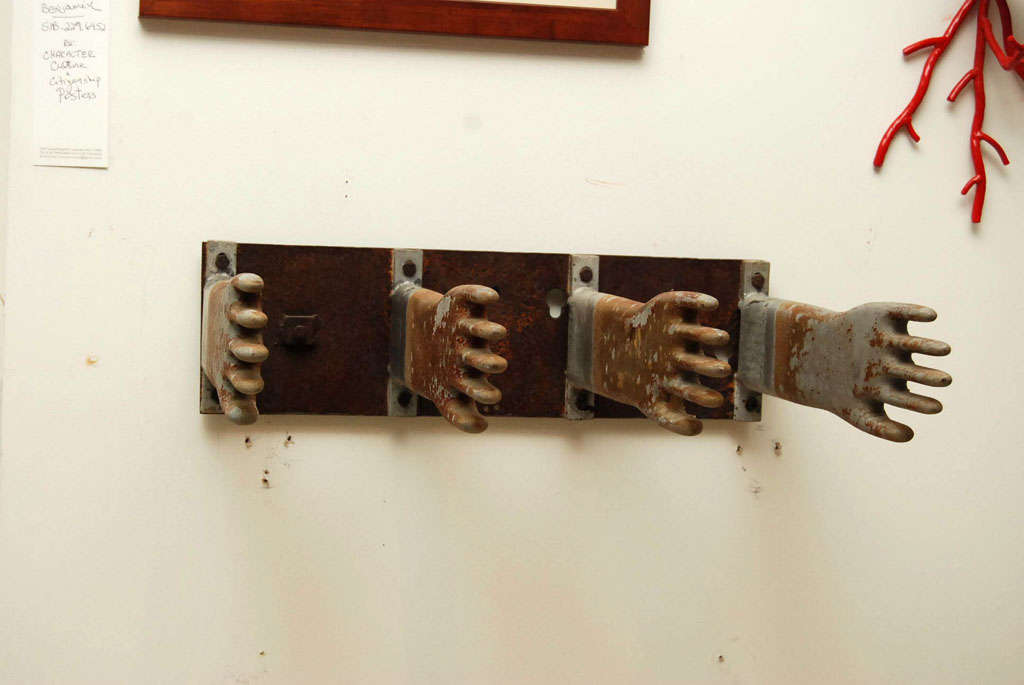 Industrial Mold is Cast from Aluminum and was Used to Create a Heavy Commercial Grade Rubber Glove.    Today of course, the form Makes a Highly Functional Coat Rack, Towel Rack or Art Object
