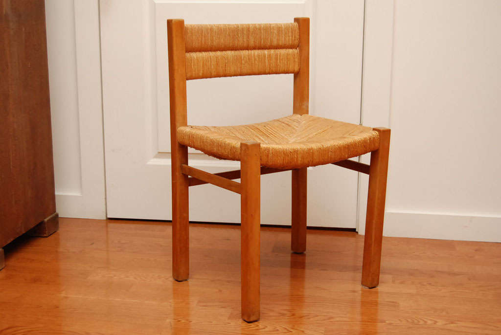 Designed by Pierre Gautier-Delaye.Charming oak with rush seat, dining chairs.

a total of four are available.