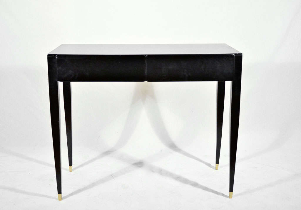 Gio Ponti toilettes, produced by Giordano Chiesa for the Hotel Royal in Naples
Italy, 1955/2011
black lacquered Italian walnut, brass, two drawers
36.75 w x 18 d x 30.5 h inches
Sold with a copy of a letter of authentication from Lisa Licitra