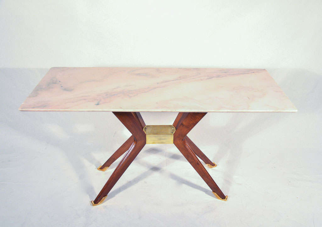 a rare low table by Arch Maro Gottardi;walnut,bronze and pink marble.Biblio:Aloi 