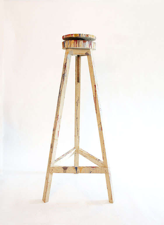 Pair of adjustable sculptor/painter's stands; Painted finish with paint splatter; Can adjust up to 70
