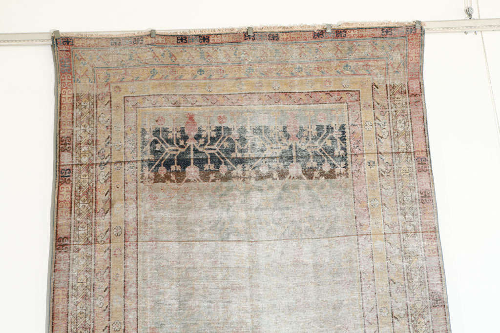 Antique Khotan Rug In Distressed Condition For Sale In West Hollywood, CA