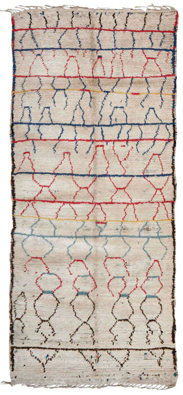 Here is a delightfully designed Moroccan Vintage Rug. Straw, beige, brown, orange, red and blue. The rug presents columns of irregular loops and ovals. A palette of selected spring colors would be an interesting choice.