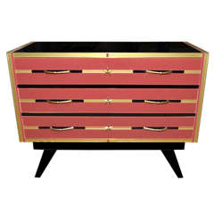 Chest of drawers in mirror.