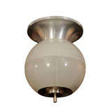 Aluminum flush mount ceiling fixture with frosted glass globe