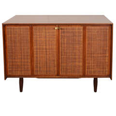 Hand crafted solid walnut sideboard with caned doors