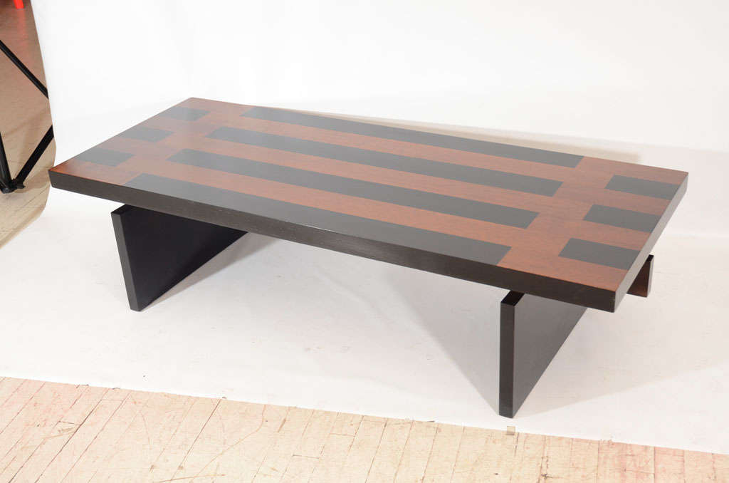 Striking Lane walnut coffee table; block construction finished with lacquered black accents to compliment its graphic design and form. Trestle table base also lacquered in black. Please contact for location. 