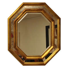 Impressive gilded hexagonal mirror
