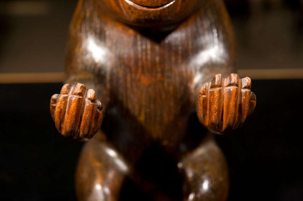 Mahogany Carved spill vase in the form of a monkey For Sale