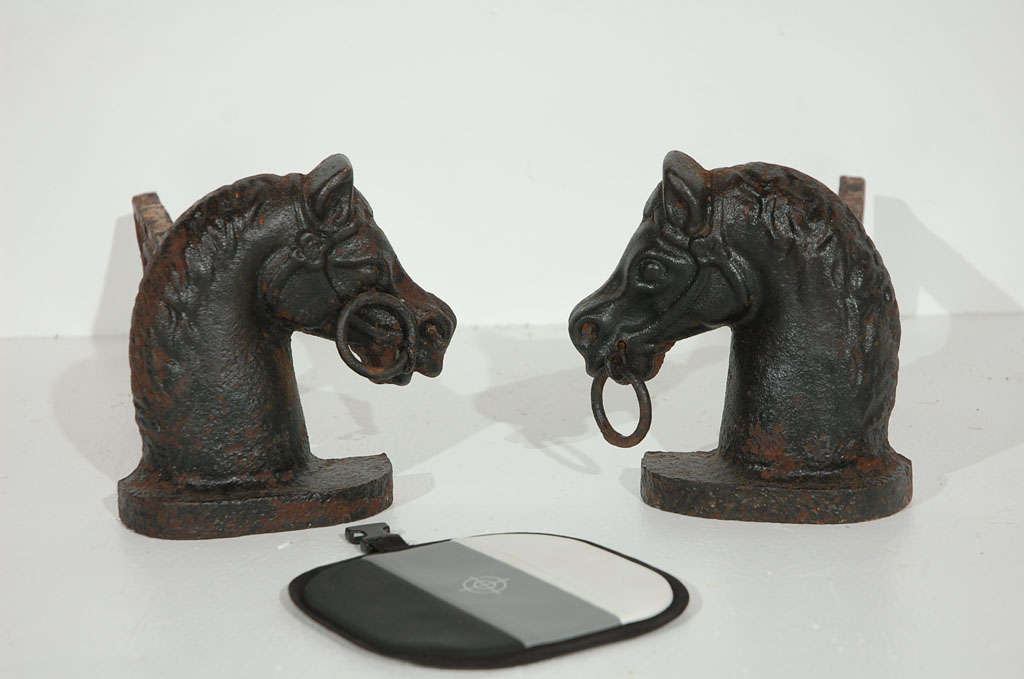 FANTASTIC AND FOLKY 19THC ORIGINAL PAINTED HORSE HEAD HITCHING POST FIREPLACE ANDIRONS.THIS MATCHING PAIR OF CAST IRON HORSE HEAD ANDIRONS ARE IN GREAT CONDITION.