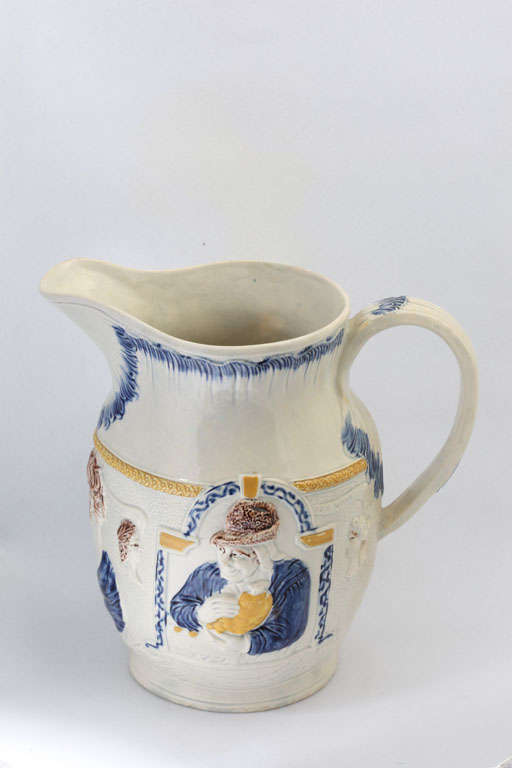 A fine English pearlware pitcher molded in relief with 