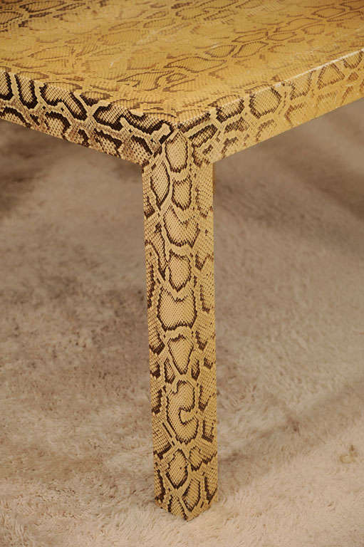 Parson-style table in fabulous butter yellow and chocolate brown python.