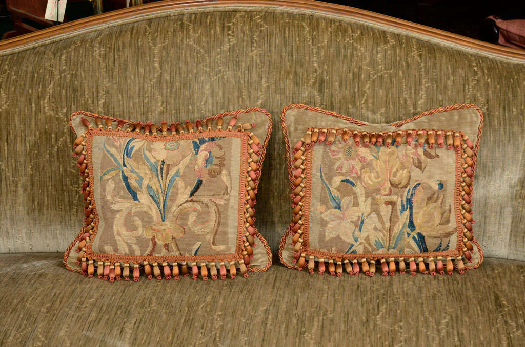 A pair of tapestry cushions