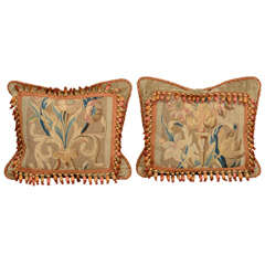 A pair of tapestry cushions