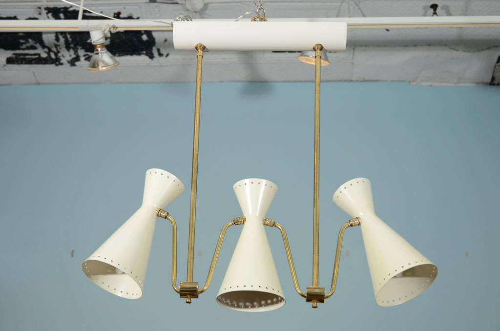 Great hanging fixture with rotating double-cone shades.  This light has 3 larger edison sockets and 3 smaller candelabra sockets.  White painted metal shades and polished brass mounts.   To see our entire inventory, go to www.donzella.com