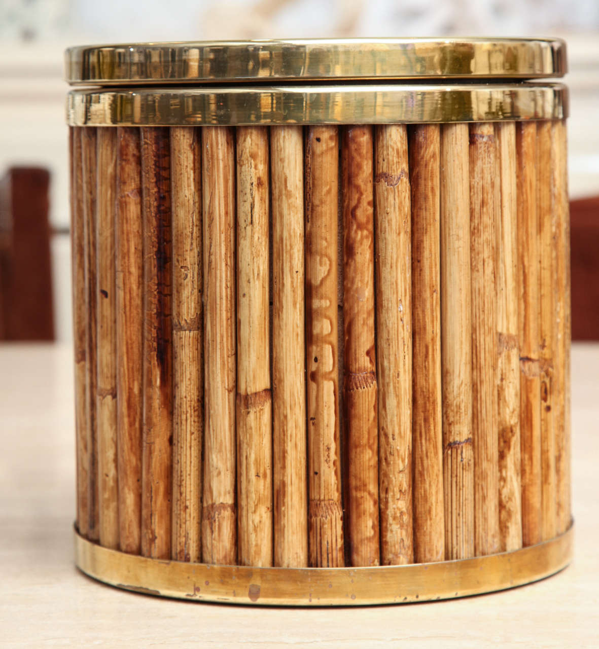 Ice bucket in bamboo with brass bottom, rim and lid.
Signed: Gabriella Crespi.
Italian, circa 1970.