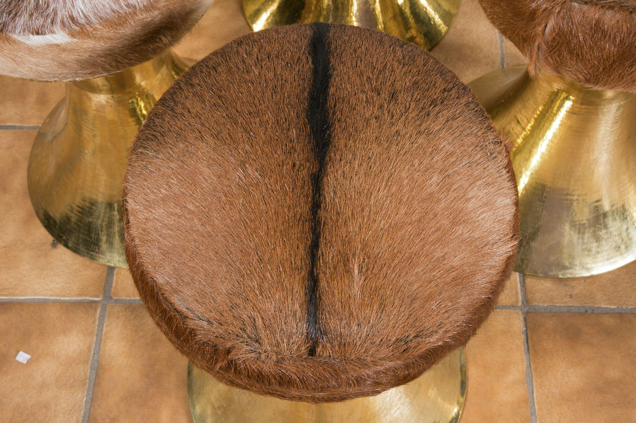 Pair of 1970's brass stools with goat hair
Price provided for a pair