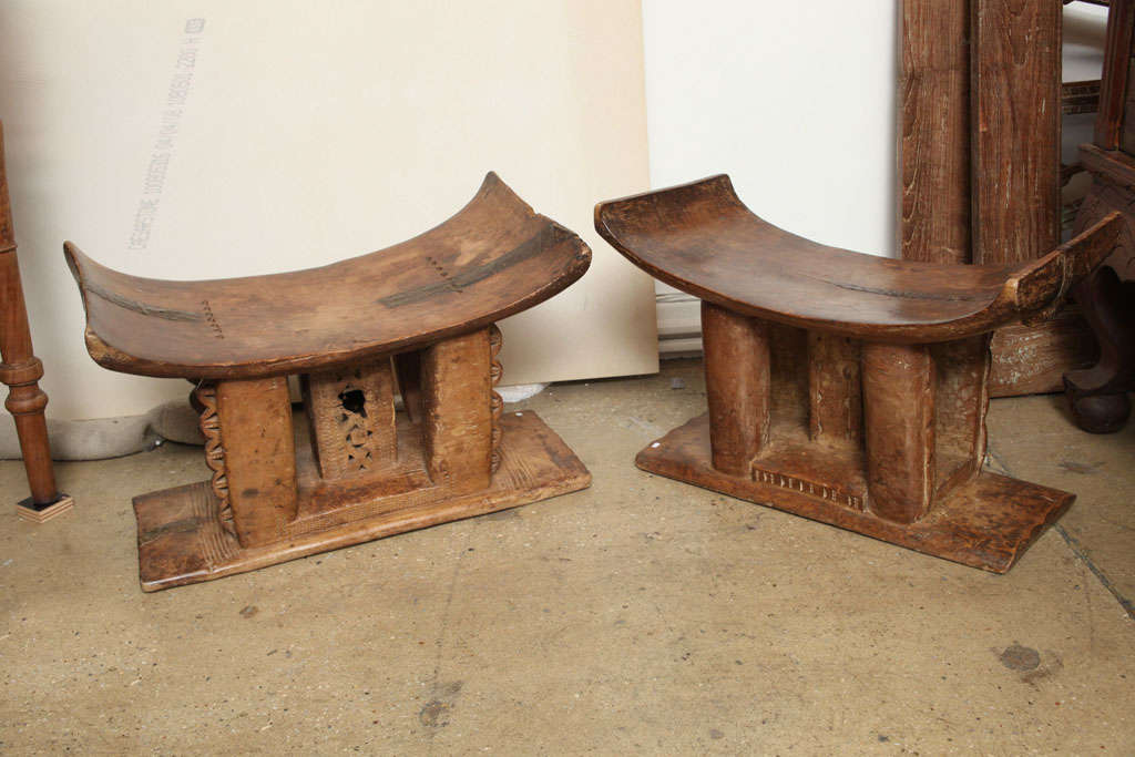 Hand carved tradtional Asante (Ashante) Stools from Ghana.  Metal stripped tacked onto seat add character to these unique items highly useful as side table, stands or stools.  Sizes vary.  Sizes for item on right are shown below.  Sold separately.