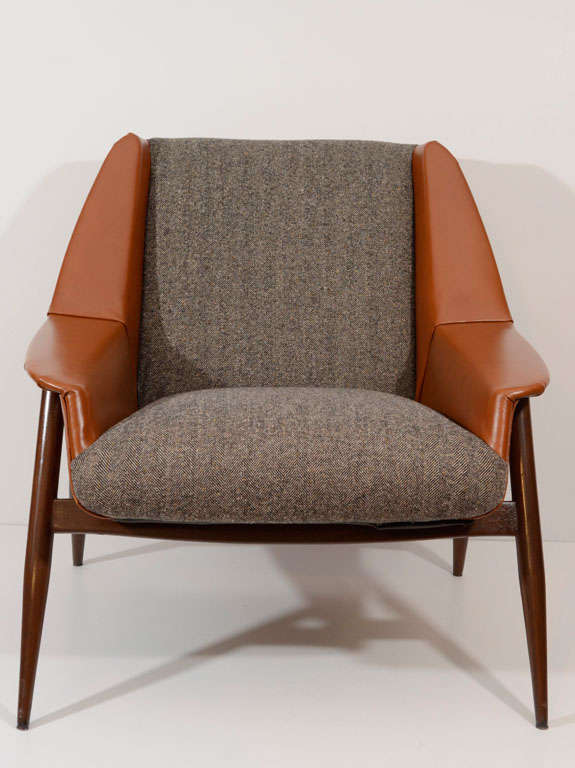 Vintage flanged armchair reupholstered in wool Herringbone and leather.