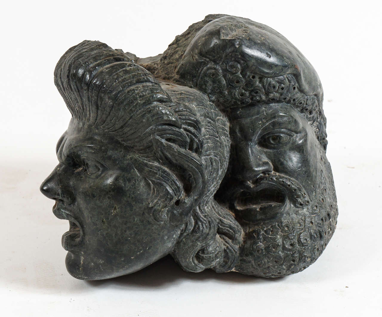 Grand Tour sculpture of conjoined drama masks carved in verde marble.