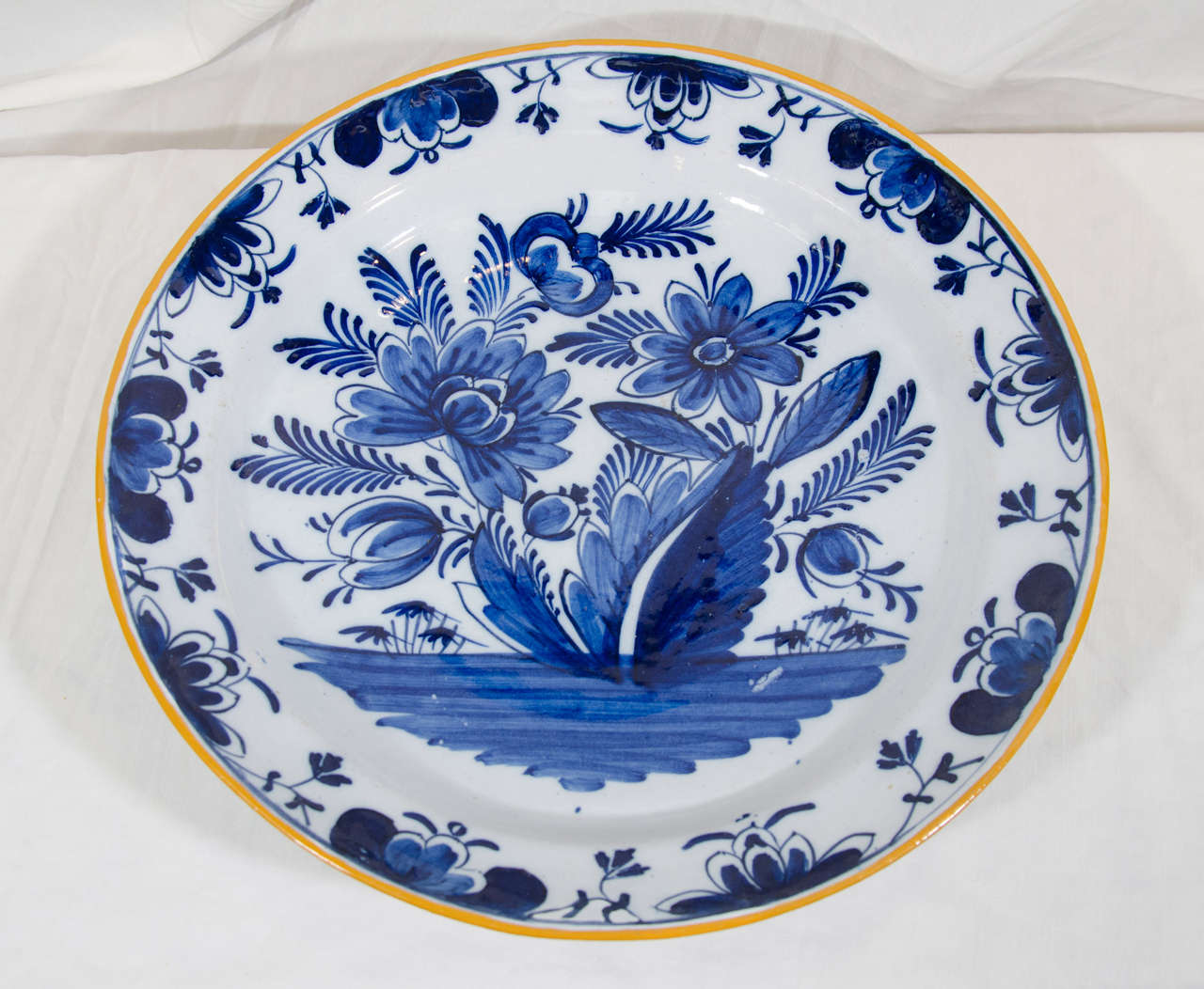 A Pair of Antique Blue and White Dutch Delft Chargers