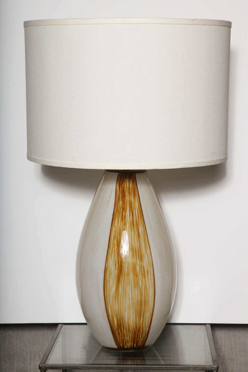 Striking white infused with both bold and subtle amber vertical lines,  Base is 20