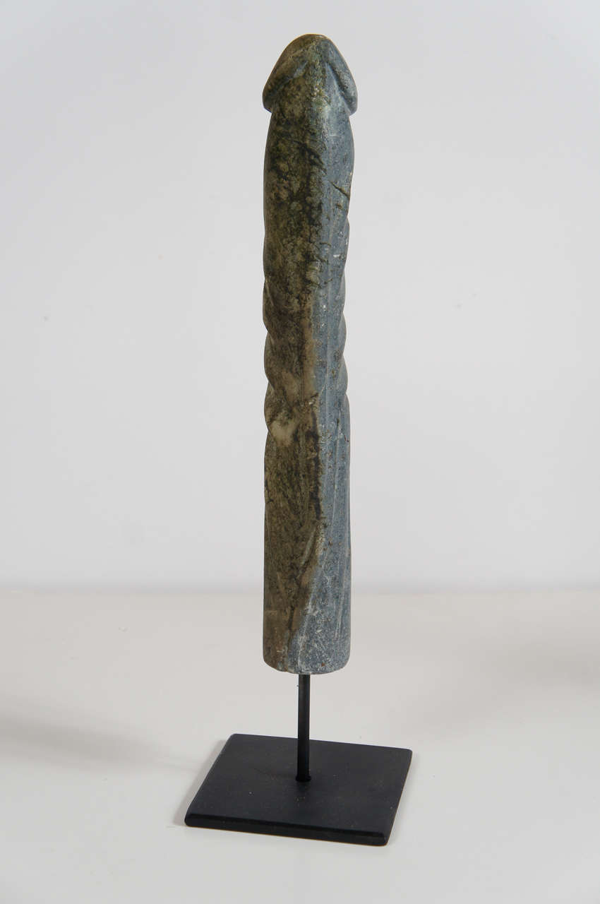 Tribal A Set of Carved Stone Penis Sculptures on Iron Stands