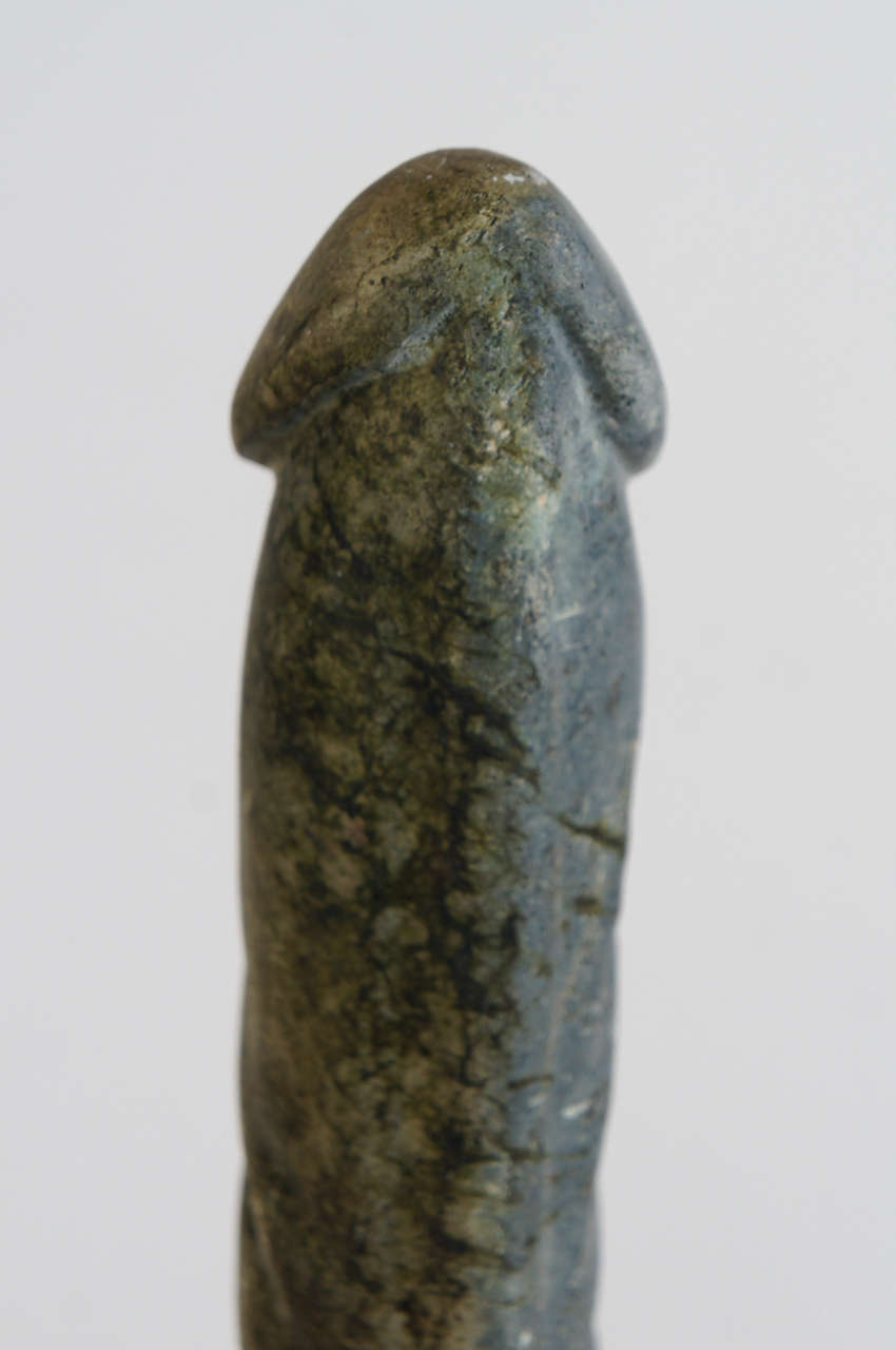 American A Set of Carved Stone Penis Sculptures on Iron Stands