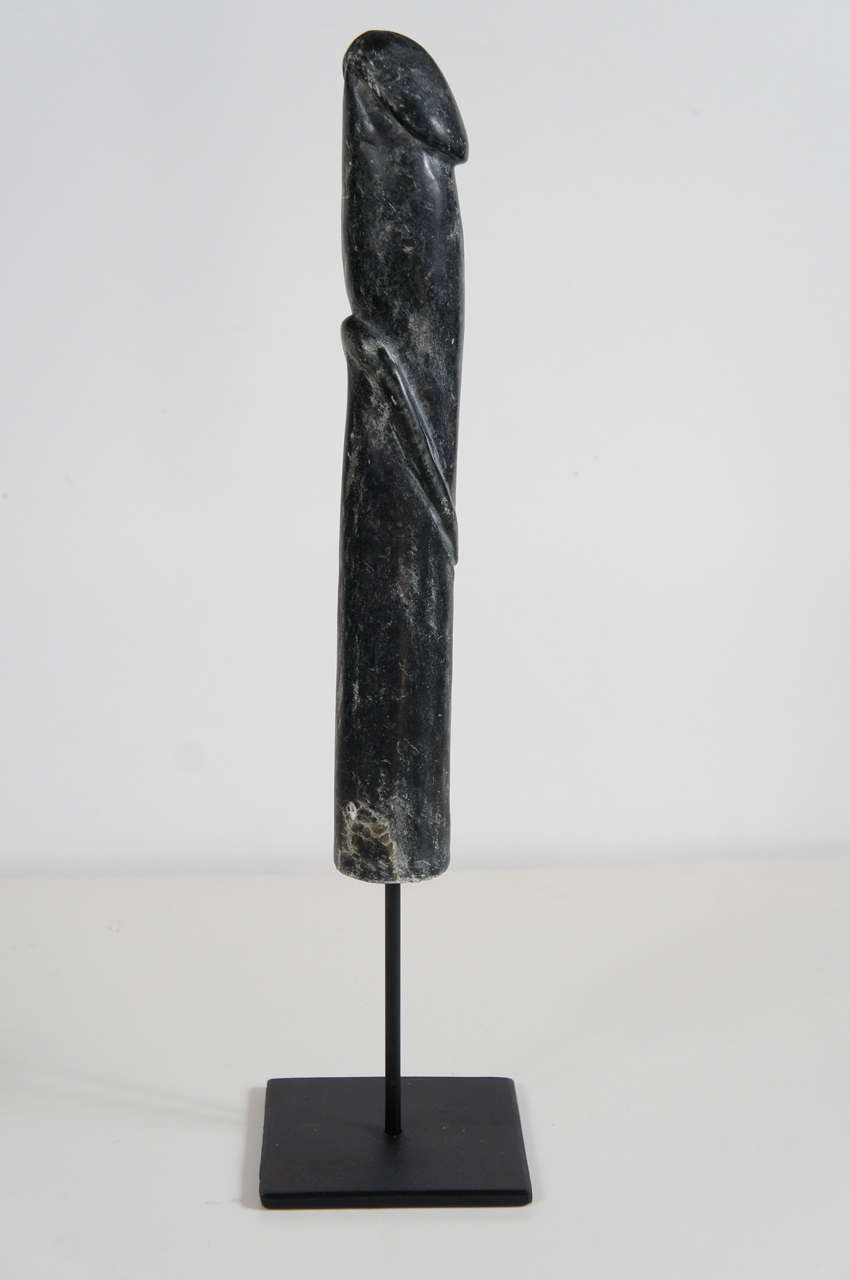 A Set of Carved Stone Penis Sculptures on Iron Stands 1