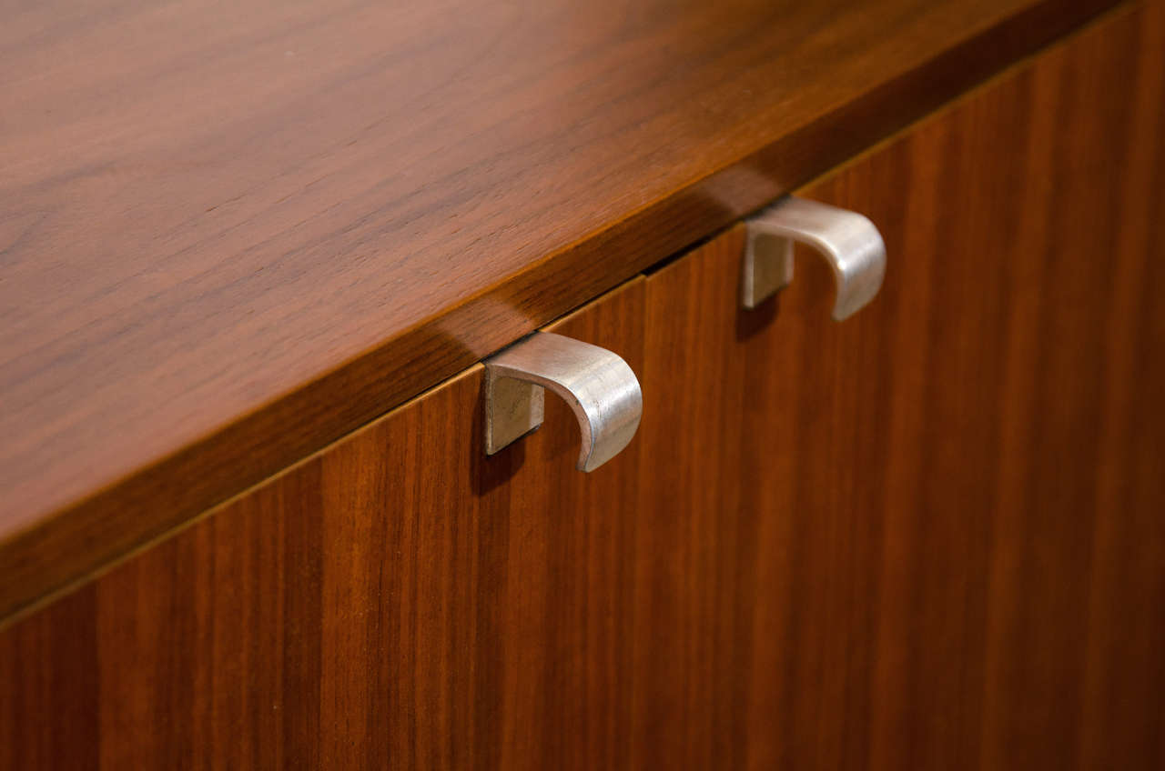 Mid-20th Century Pair of George Nelson cabinets on black bench, mfg. Herman Miller