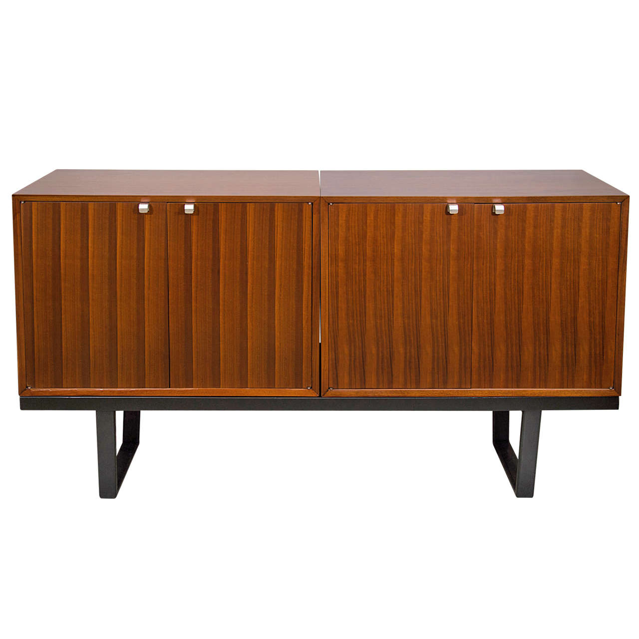 Pair of George Nelson cabinets on black bench, mfg. Herman Miller